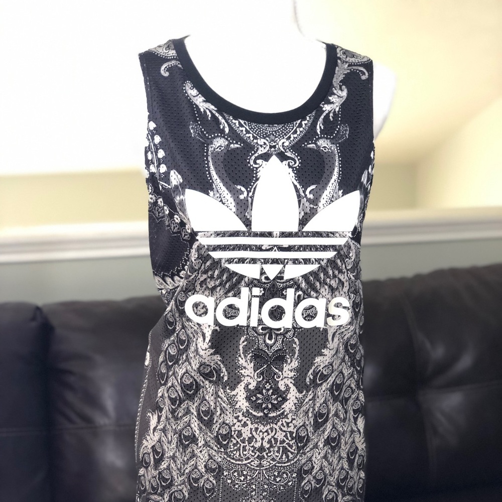 Adidas jersey dress size medium.